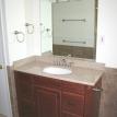 Granite vanity top with cherry cabinet